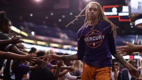 Getty Images Brittney Griner #42 of the Phoenix Mercury high fives fans as she walks off the court following the first half of the WNBA game against the San Antonio Stars at Talking Stick Resort Arena on July 30, 2017 in Phoenix, Arizona