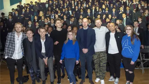 AFP Prince William, Professor Green and a crowd of pupils