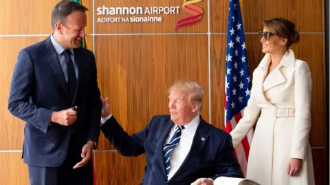 Getty Images Donald and Melania Trump signed the visitors book at Shannon Airport