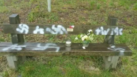Swastikas sprayed on D-Day veterans' bench at Twyford Woods