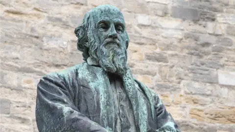 Getty Images Statue to Barnes stands outside St Peter's Church in Dorchester