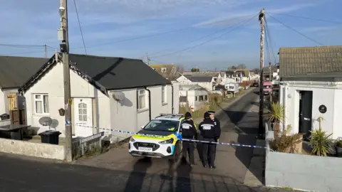 Shaun Whitmore/BBC Police at the scene in Hillman Avenue, Jaywick-on-Sea, on Monday, 5 February