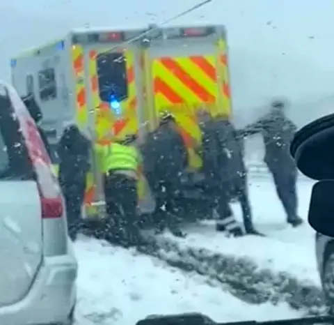 Fubar News ambulance stuck in snow