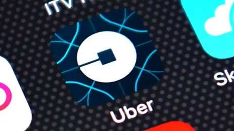 Carl Court/Getty A photo of the Uber app