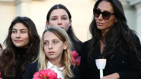 Getty Images Vicky Cornell (R) and family Toni, Christopher and Lilli Jean Cornell