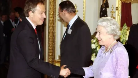 PA Media Tony Blair and the Queen