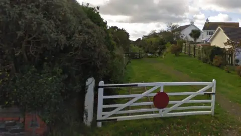 Google Gate on former steam railway line at Kirk Michael