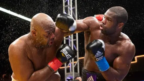 Daniel Dubois punches Trevor Bryan