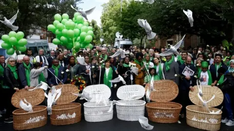 Reuters White doves released