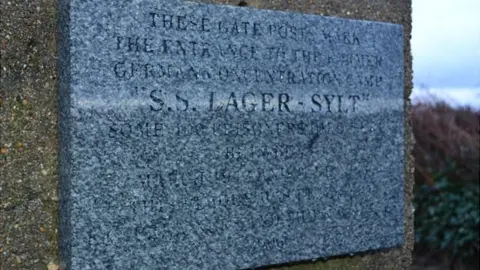 Sign on gateposts to former concentration camp SS Lager Sylt