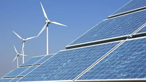 Getty Images wind farm and solar panels