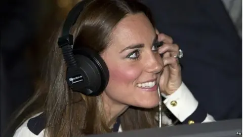 PA The Duchess of Cambridge "listens in on the enemy" during a visit to Bletchley Park