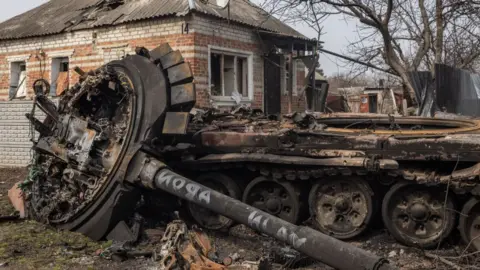 Getty Images A Russian tank destroyed near Kharkiv