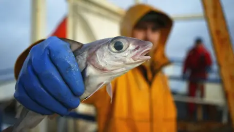 Getty Images fisherman with fish