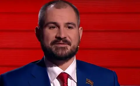 Screenshot/Rossiya1 Maxim Suraikin - TV interview on Rossiya 1 channel