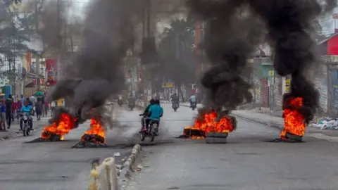 EPA Protesters block the streets leading to the house of the President of Haiti, Jovenel Moise, during a new day of protests in Port-au-Prince, Haiti, 24 February 2020.