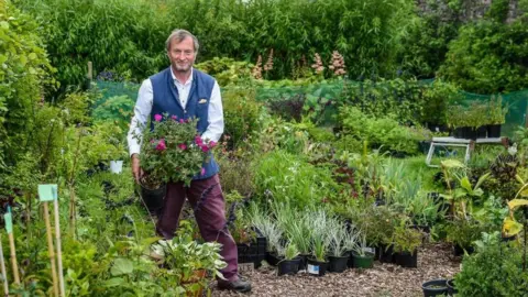 Simon Richards in his garden