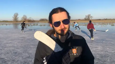 John Devine/BBC Joe Allison on the ice at Upware