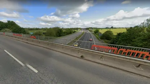 Google Brookfield Road bridge, which crosses the M5 near Churchdown in Gloucestershire