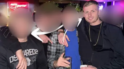 Police handout Photo later shared by Gordon to identify Mr Fisher and Dan Vann - he added arrows