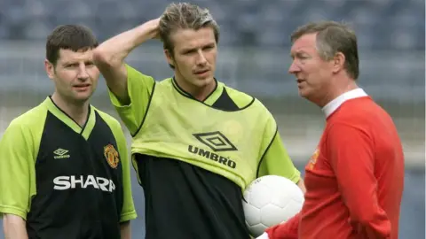 Getty Images Denis Irwin with David Beckham and Sir Alex Ferguson