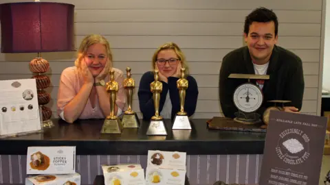 Tracy with her son James and a visiting relative