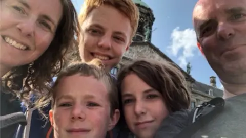 Bingham Family Sarah, Noah and Darryl, and Casper and Ariel (front)