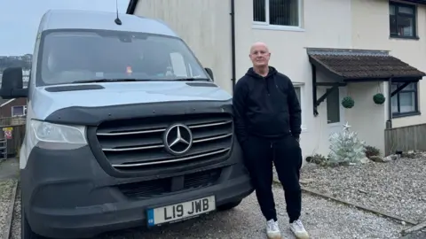 Jeff Boorer Jeff Boorer in front of his van