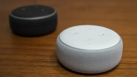 Getty Images "Echo Dots" are pictured at Amazon Headquarters in 2018