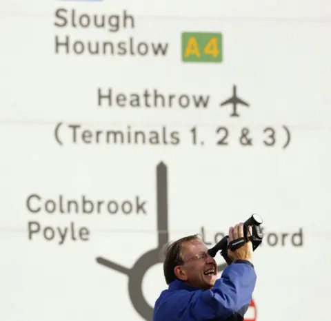 Graeme Robertson A fan films Concorde at Heathrow Airport