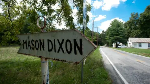 Edwin Remsberg / Alamy Stock Photo Mason Dixon sign