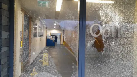 BCUHB Smashed windows on the Optic Centre