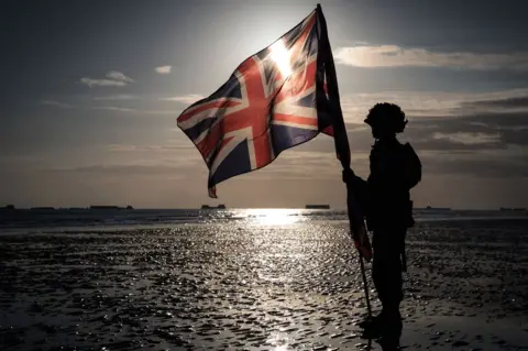 Getty Images People dressed as soldiers