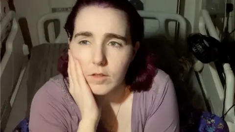 BBC Charlotte in her hospital bed