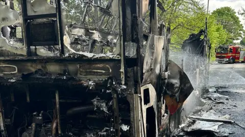 Hampshire and Wiltshire Fire and Rescue Service Burnt-out bus in Bordon