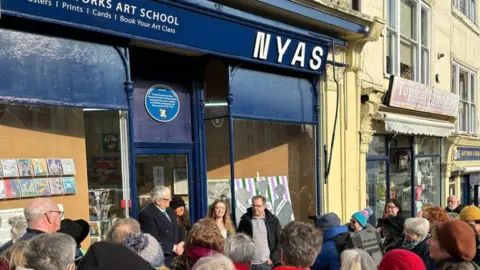 North Yorks Art School  Crowds gathered on Friday outside the North Yorks Art School shop, in St Nicholas Cliff, Scarborough, to see the plaque