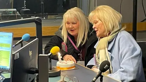 Christine Jordan and Susan Belfitt in BBC News NI's radio studio