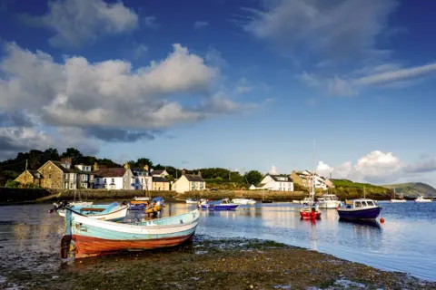 Getty Images Boats in the harbour of Newport Parrog, Pembrokeshire