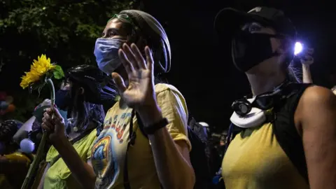 Getty Images 'Wall of Moms' protesters in Portland, Oregon, on 20 July 2020