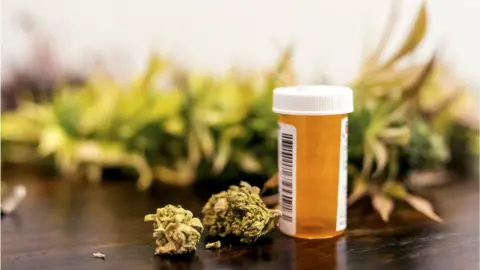 Getty Images file picture of cannabis and prescription bottle