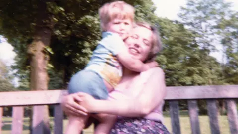 Iain Cunningham (aged two-and-a-half), with his mother, Irene Cunningham