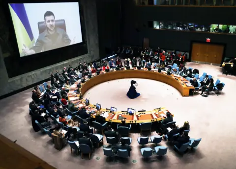 Getty Images Ukrainian President Volodymyr Zelensky addresses a UN Security Council meeting in New York, 4 April 2022