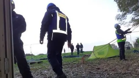 Dunsfold Climate Emergency Camp Bailiffs dismantling Dunsfold Climate Camp