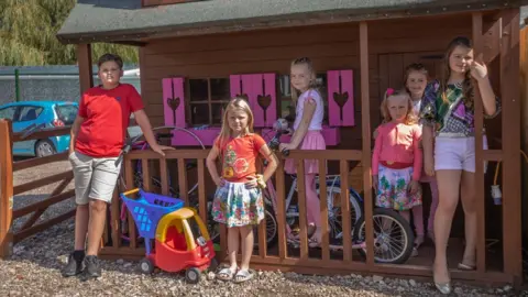 Some of the children who live on the land