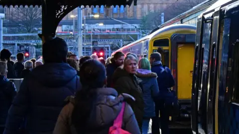 Getty Images Are passengers charged extra to travel at peak time?