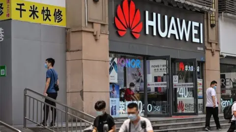 AFP/ Getty Images Huawei store