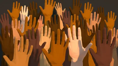 Getty Images Hands of different races