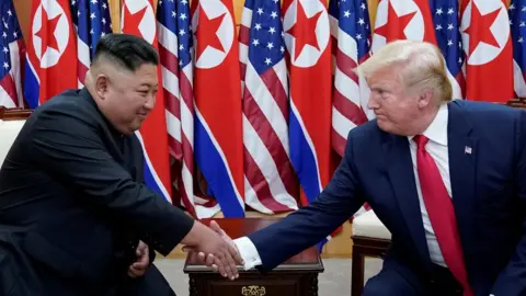 Reuters US President Donald Trump shakes hands with North Korean leader Kim Jong-un at the demilitarized zone separating the two Koreas