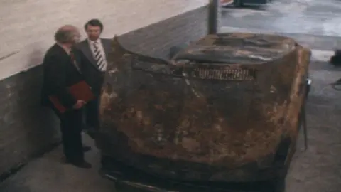 Renee MacRae's burned-out car