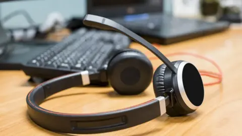 Getty Images Headphones and a keyboard